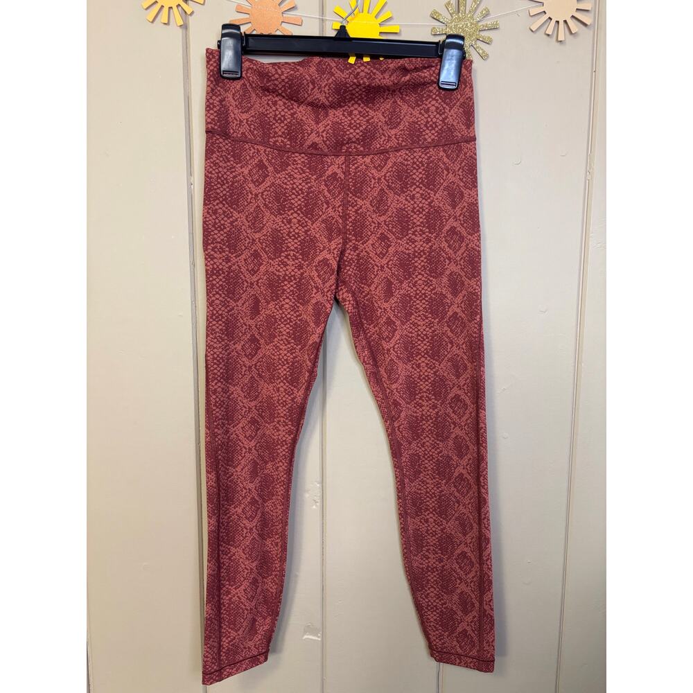 Athleta orange snake print leggings stash pocket 7/8 length small